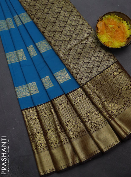 Semi kanchipuram silk saree cs blue and coffee brown with zari woven box type buttas and zari woven korvai border