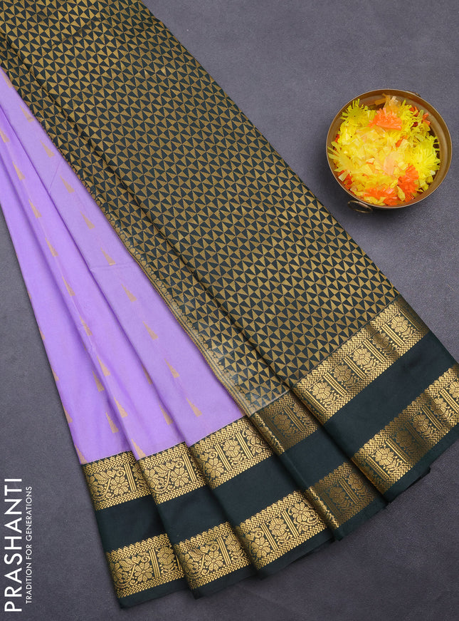 Semi kanchipuram silk saree lavender and bottle green with zari woven buttas and rettapet zari woven korvai border