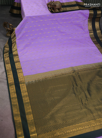 Semi kanchipuram silk saree lavender and bottle green with zari woven buttas and rettapet zari woven korvai border