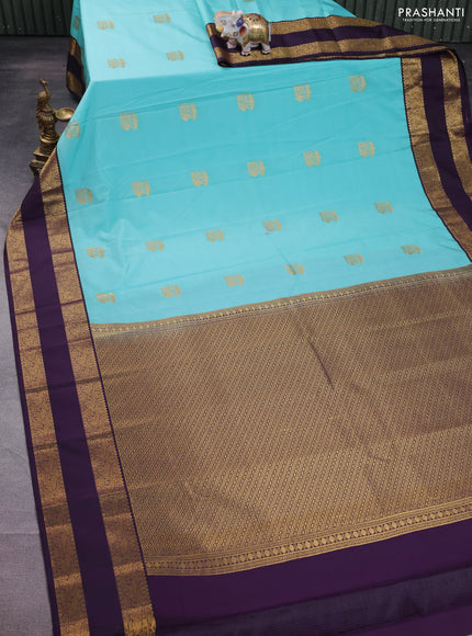 Semi kanchipuram silk saree teal blue and deep jamun with zari woven buttas and rettapet zari woven korvai border