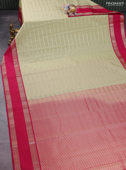 Semi kanchipuram silk saree mild pista green and pink with allover zari woven stripes pattern and rettapet zari woven korvai border