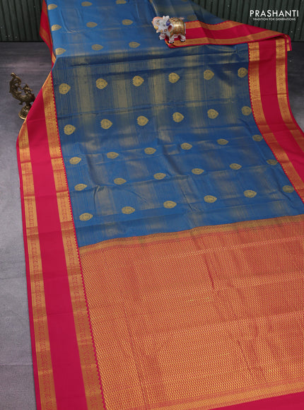 Semi kanchipuram silk saree peacock blue and pink with allover zari stripes & buttas and rettapet zari woven korvai border