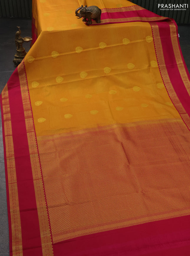 Semi kanchipuram silk saree mango yellow and pink with allover zari woven stripes pattern & buttas and rettapet zari woven korvai border