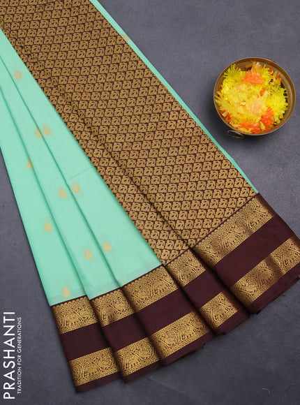 Semi kanchipuram silk saree teal green and deep maroon with zari woven buttas and rettapet zari woven korvai border
