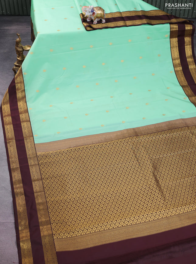 Semi kanchipuram silk saree teal green and deep maroon with zari woven buttas and rettapet zari woven korvai border