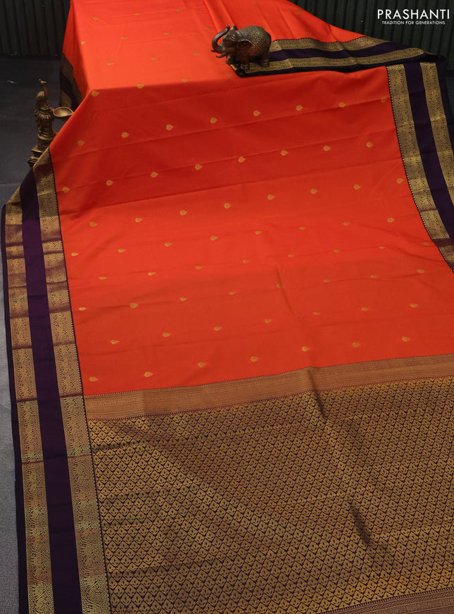 Semi kanchipuram silk saree orange and deep jamun with zari woven buttas and rettapet zari woven korvai border