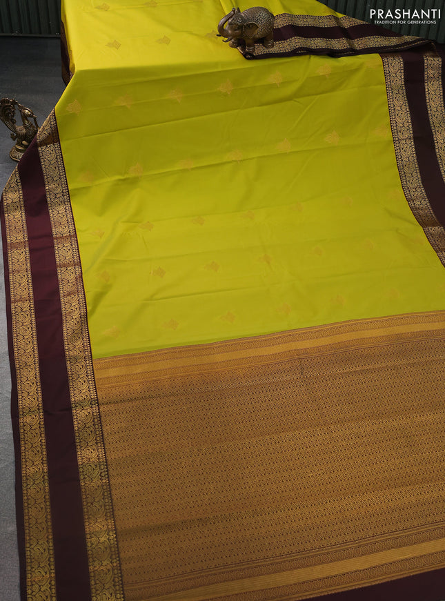 Semi kanchipuram silk saree lime yellow and deep maroon with zari woven buttas and rettapet zari woven korvai border