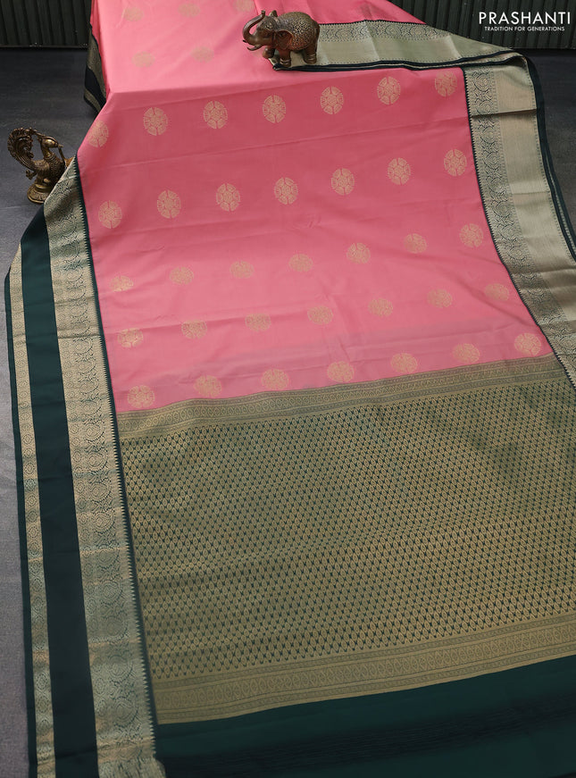 Semi kanchipuram silk saree peach pink and bottle green with zari woven buttas and rettapet zari woven korvai border