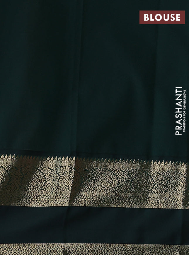 Semi kanchipuram silk saree peach pink and bottle green with zari woven buttas and rettapet zari woven korvai border