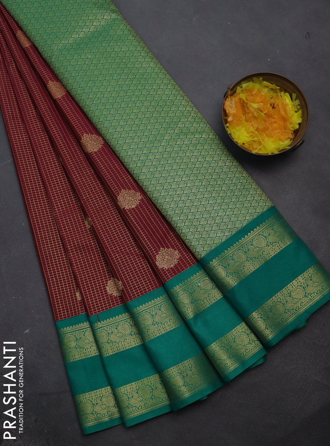 Semi kanchipuram silk saree dual shade of maroon and teal green with allover small zari checks & buttas and rettapet zari woven korvai border