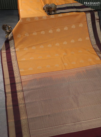 Semi kanchipuram silk saree mustard yellow and deep maroon with allover small zari checks & buttas and rettapet zari woven korvai border