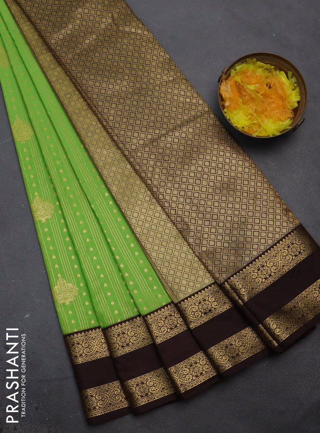 Semi kanchipuram silk saree light green and coffee brown with allover zari weaves & buttas and rettapet zari woven korvai border