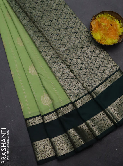 Semi kanchipuram silk saree pista green and bottle green with allover zari weaves & buttas and rettapet zari woven korvai border