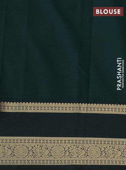 Semi kanchipuram silk saree pista green and bottle green with allover zari weaves & buttas and rettapet zari woven korvai border