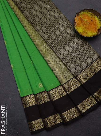 Semi kanchipuram silk saree light green and coffee brown with zari woven buttas and rettapet zari woven korvai border