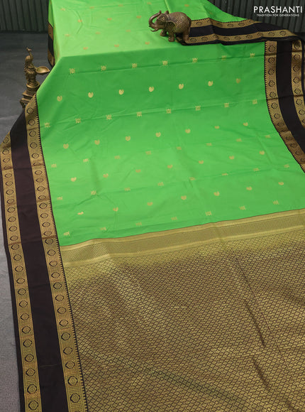 Semi kanchipuram silk saree light green and coffee brown with zari woven buttas and rettapet zari woven korvai border