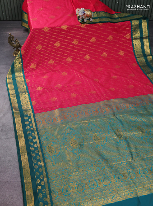 Semi kanchipuram silk saree pink and peacock green with allover zari weaves & buttas and zari woven korvai border