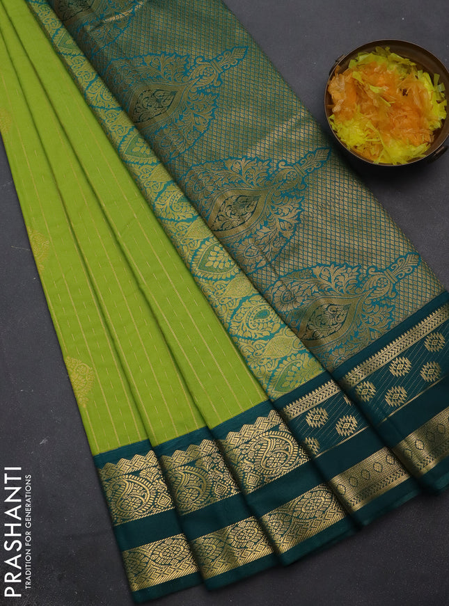 Semi kanchipuram silk saree fluorescent green and peacock green with allover zari weaves & buttas and zari woven korvai border