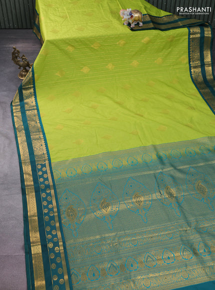Semi kanchipuram silk saree fluorescent green and peacock green with allover zari weaves & buttas and zari woven korvai border
