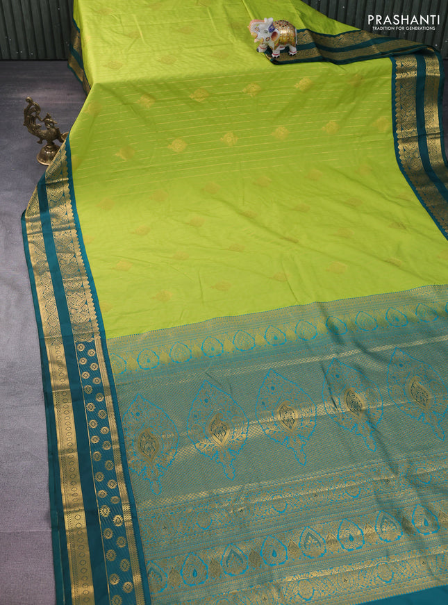 Semi kanchipuram silk saree fluorescent green and peacock green with allover zari weaves & buttas and zari woven korvai border