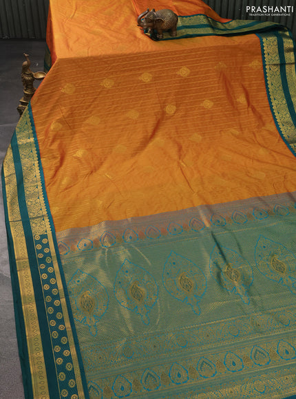 Semi kanchipuram silk saree sunset orange and peacock green with allover zari weaves & buttas and zari woven korvai border