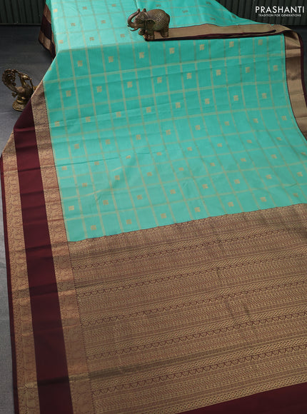 Semi kanchipuram silk saree teal green and deep maroon with allover zari checks & buttas and rettapet zari woven korvai border