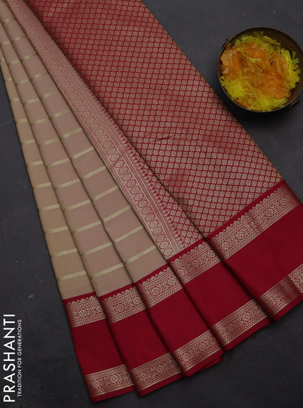 Semi kanchipuram silk saree sandal and pink with zari woven stripes pattern and rettapet zari woven korvai border