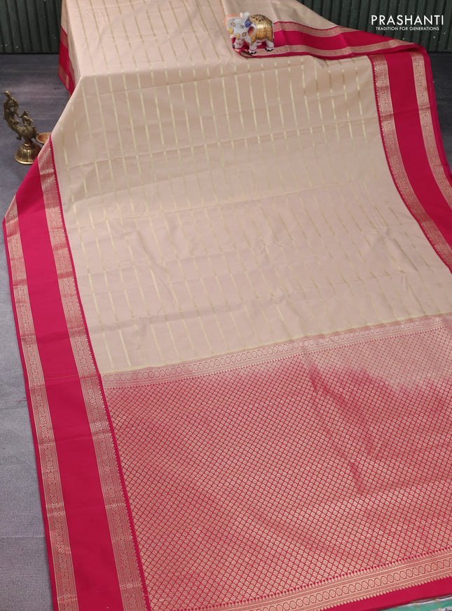 Semi kanchipuram silk saree sandal and pink with zari woven stripes pattern and rettapet zari woven korvai border
