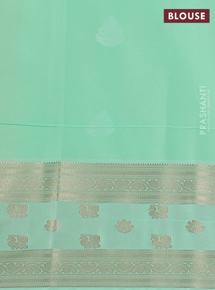 Semi kanchipuram silk saree mustard yellow and teal green with zari woven buttas and rettapet zari woven korvai border