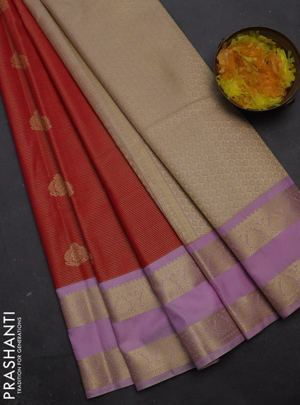 Semi kanchipuram silk saree dual shade of pinkish orange and lavender with allover zari weaves & buttas and rettapet zari woven korvai border