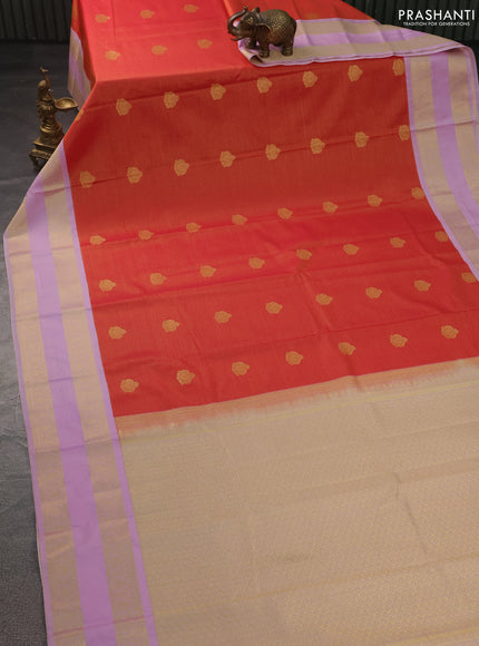 Semi kanchipuram silk saree dual shade of pinkish orange and lavender with allover zari weaves & buttas and rettapet zari woven korvai border