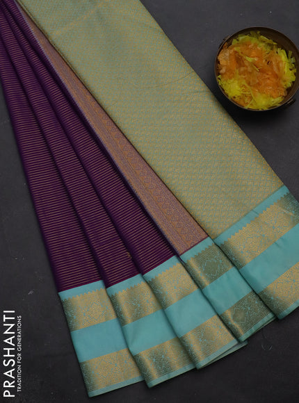Semi kanchipuram silk saree purple and light blue with allover zari weaves & buttas and rettapet zari woven korvai border