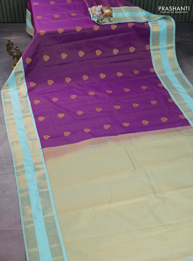 Semi kanchipuram silk saree purple and light blue with allover zari weaves & buttas and rettapet zari woven korvai border