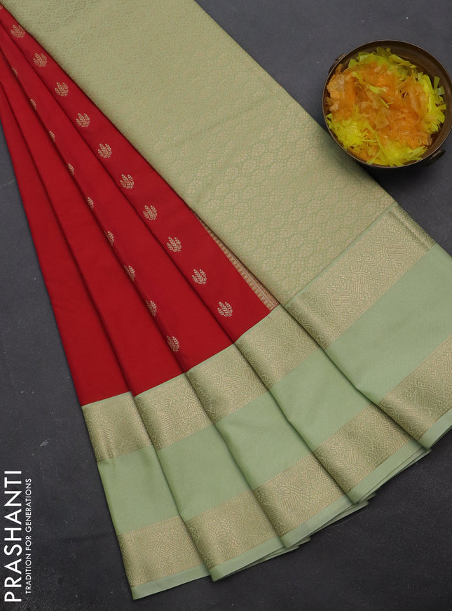 Semi kanchipuram silk saree reddish pink and pista green with allover zari weaves & buttas and rettapet zari woven korvai border