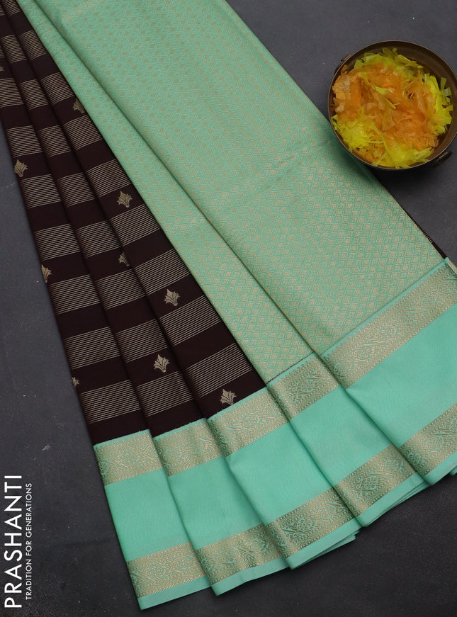 Semi kanchipuram silk saree brown and teal green with allover zari weaves & buttas and rettapet zari woven korvai border