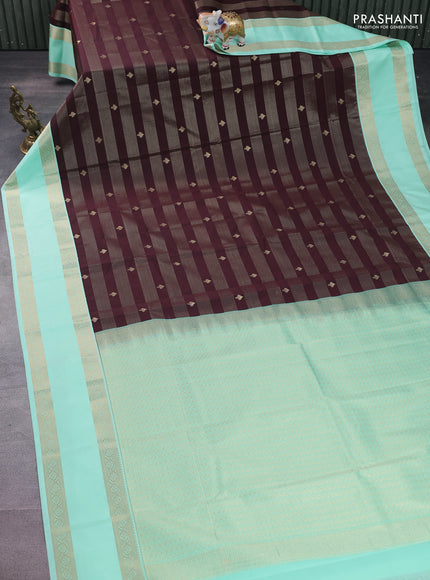 Semi kanchipuram silk saree brown and teal green with allover zari weaves & buttas and rettapet zari woven korvai border