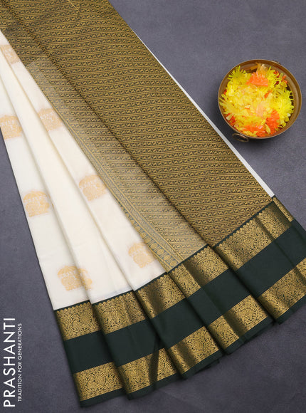 Semi kanchipuram silk saree off white and bottle green with annam zari woven buttas and rettapet zari woven korvai border