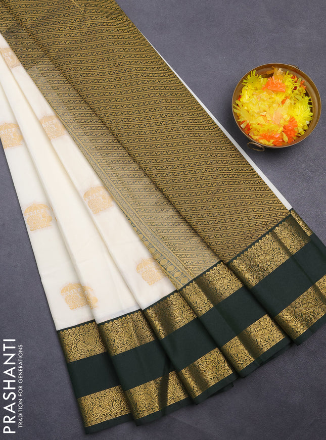 Semi kanchipuram silk saree off white and bottle green with annam zari woven buttas and rettapet zari woven korvai border