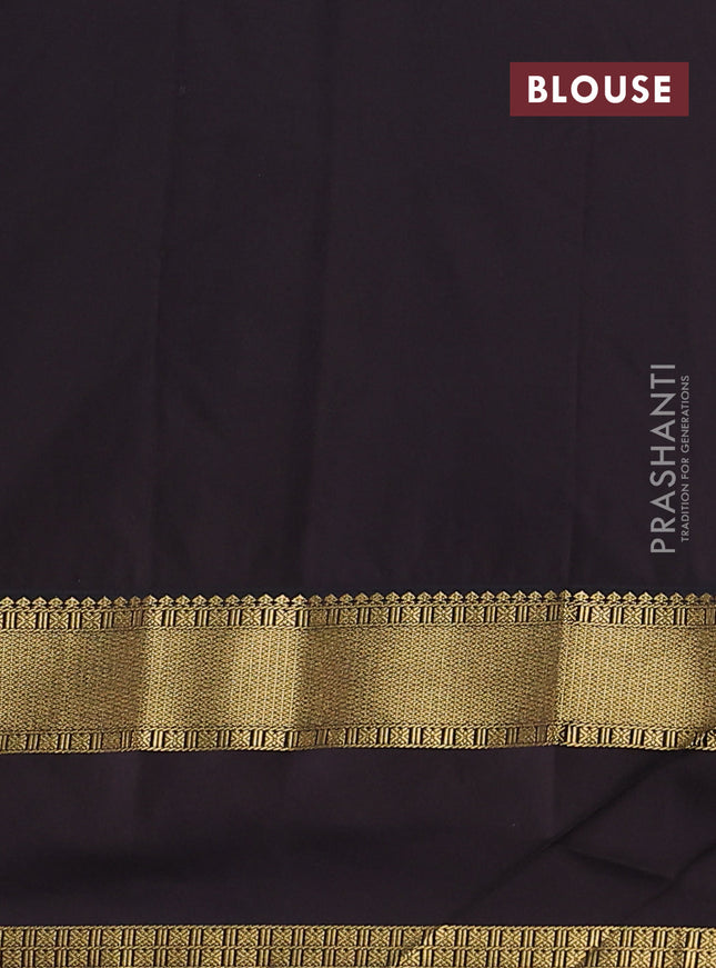 Semi kanchipuram silk saree light green and deep coffee brown with floral zari woven buttas and rettapet zari woven korvai border