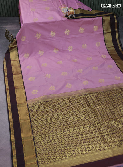 Semi kanchipuram silk saree mauve pink and deep maroon with floral zari woven buttas and rettapet zari woven korvai border