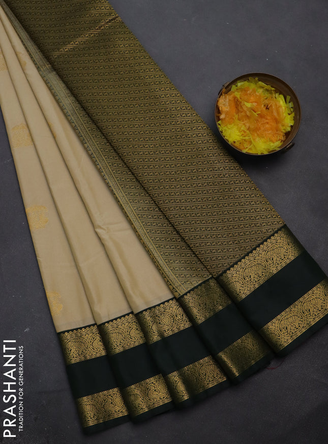 Semi kanchipuram silk saree sandal and bottle green with annam zari woven buttas and rettapet zari woven korvai border