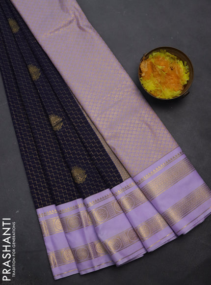 Semi kanchipuram silk saree navy blue and lavender with allover zari weaves & buttas and rettapet zari woven korvai border
