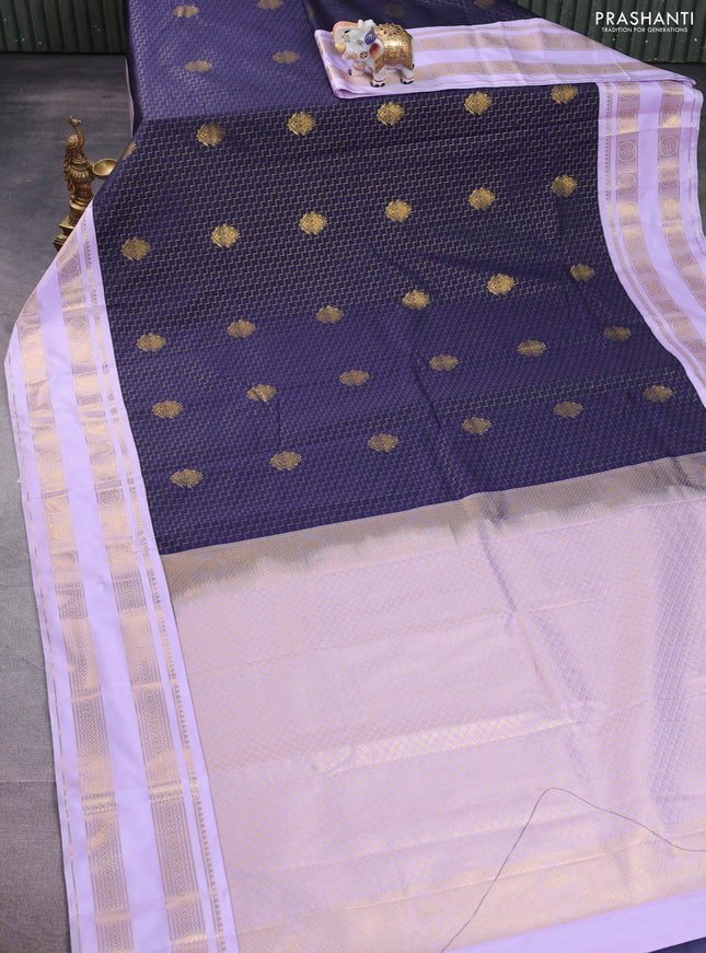 Semi kanchipuram silk saree navy blue and lavender with allover zari weaves & buttas and rettapet zari woven korvai border