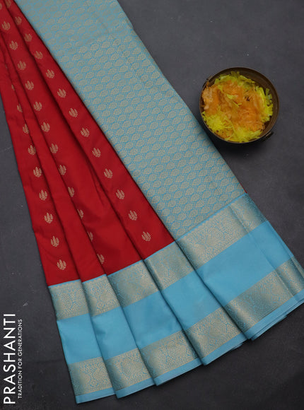 Semi kanchipuram silk saree reddish pink and light blue with zari woven buttas and rettapet zari woven korvai border