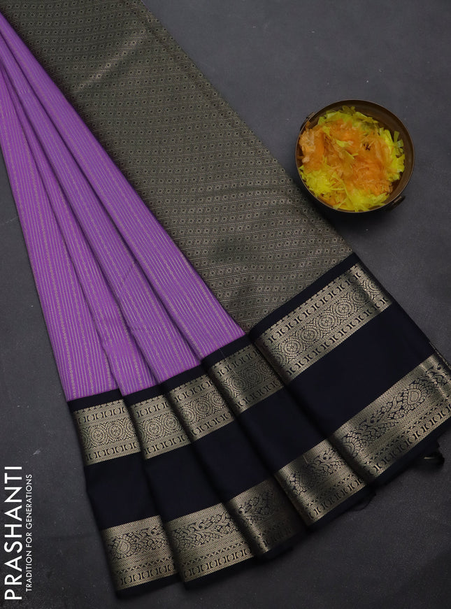 Semi kanchipuram silk saree lavender and navy blue with allover zari weaves and rettapet zari woven korvai border