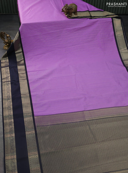 Semi kanchipuram silk saree lavender and navy blue with allover zari weaves and rettapet zari woven korvai border