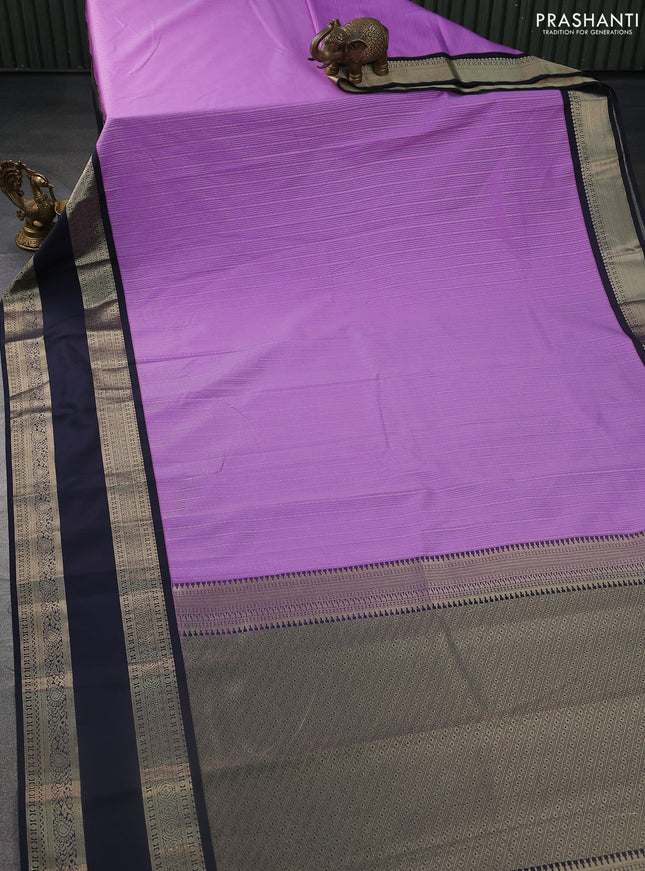 Semi kanchipuram silk saree lavender and navy blue with allover zari weaves and rettapet zari woven korvai border
