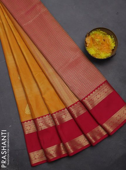 Semi kanchipuram silk saree mango yellow and pink with allover zari weaves & buttas and rettapet zari woven korvai border