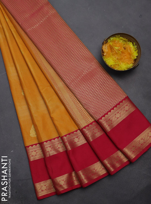 Semi kanchipuram silk saree mango yellow and pink with allover zari weaves & buttas and rettapet zari woven korvai border
