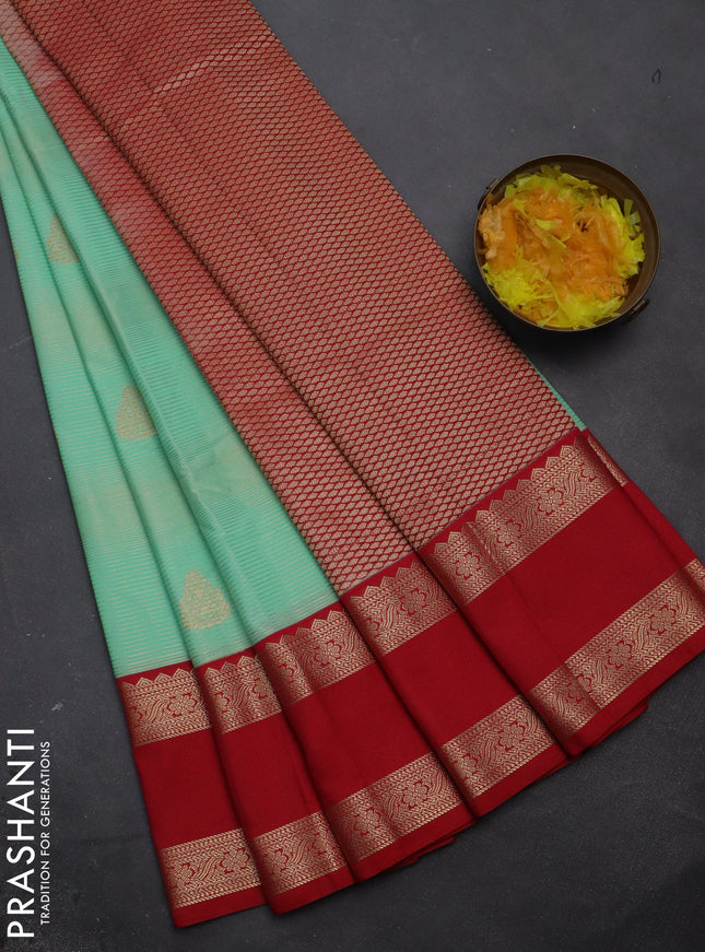 Semi kanchipuram silk saree teal green shade and red with allover zari weaves & buttas and rettapet zari woven korvai border